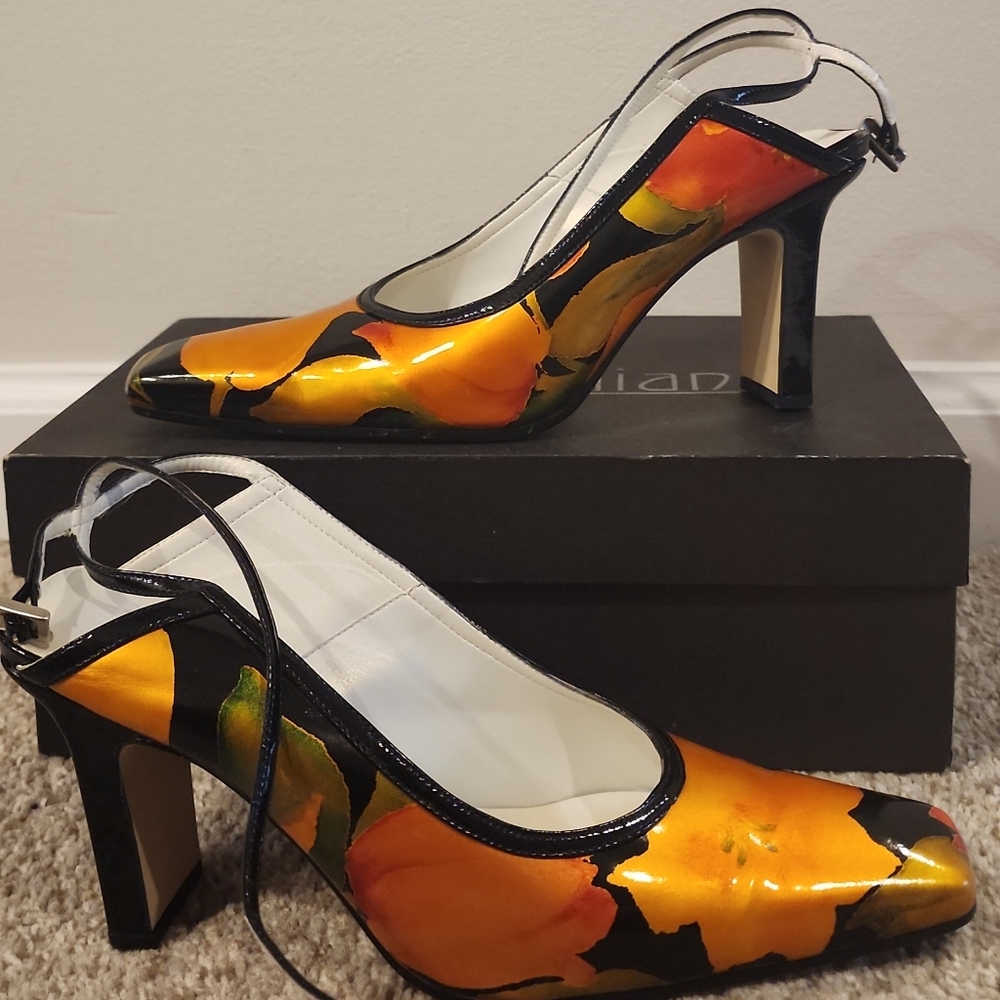Dynamic Orange and Black Heels with Sleek Silhouette